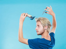 Man going to shave his long hair